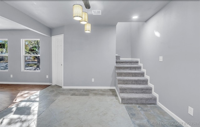 foyer featuring wood-type flooring