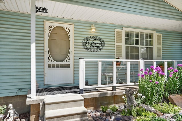 property entrance featuring covered porch