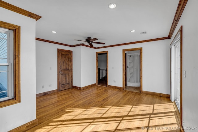 unfurnished bedroom featuring ceiling fan, light hardwood / wood-style flooring, and ornamental molding