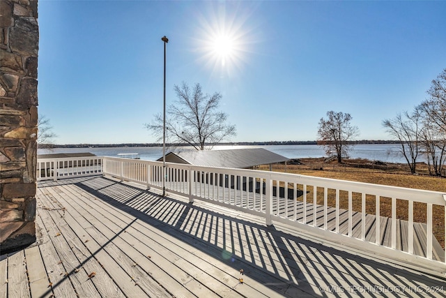 wooden deck with a water view