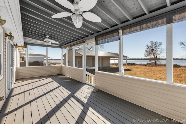 wooden terrace with a water view