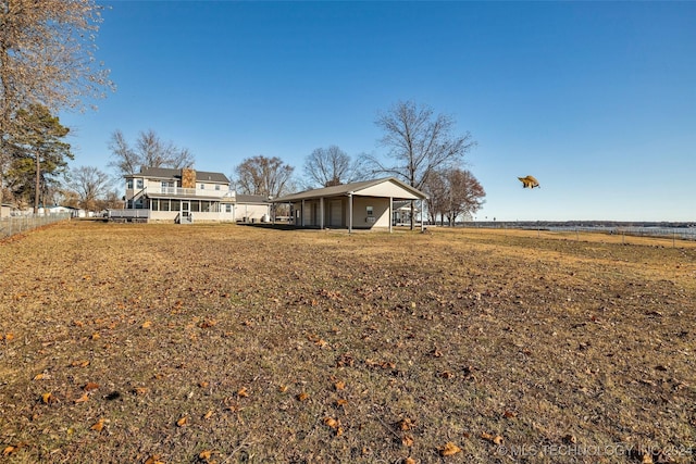 view of yard with a rural view