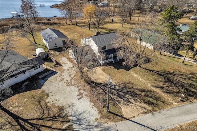 drone / aerial view with a water view