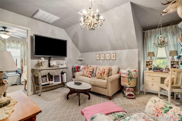 carpeted living room featuring ceiling fan with notable chandelier, lofted ceiling, and a wealth of natural light