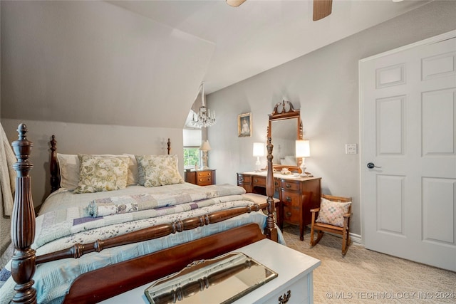 bedroom with light carpet, ceiling fan with notable chandelier, and lofted ceiling