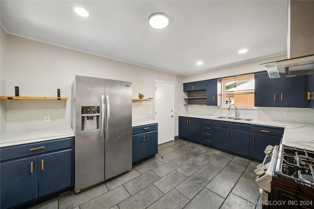 kitchen featuring decorative backsplash, stainless steel refrigerator with ice dispenser, blue cabinets, sink, and white range with gas stovetop