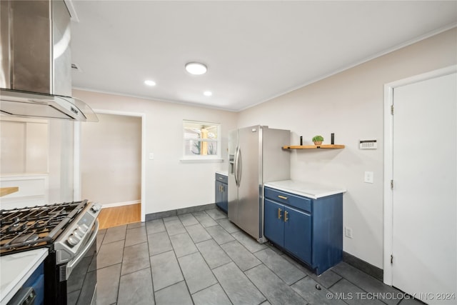 kitchen featuring stainless steel appliances, wall chimney range hood, blue cabinets, crown molding, and light hardwood / wood-style floors