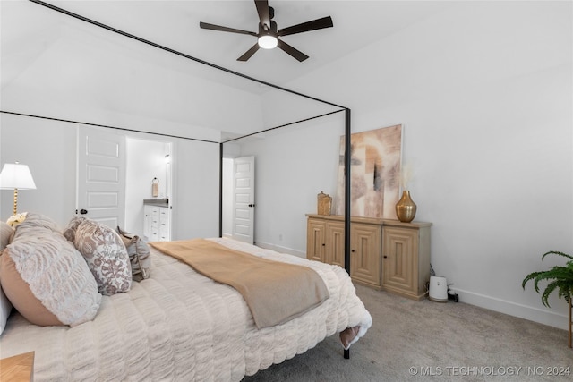 carpeted bedroom with ceiling fan and lofted ceiling