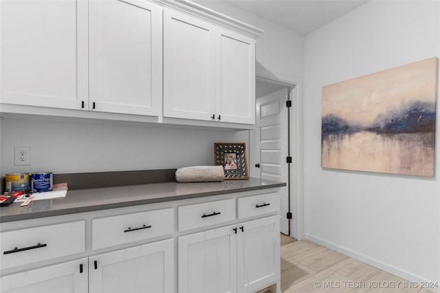 kitchen with white cabinets