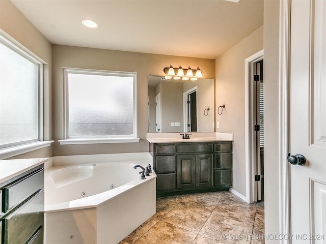 bathroom featuring a bathtub and vanity