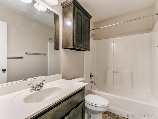 full bathroom with vanity, bathtub / shower combination, and toilet