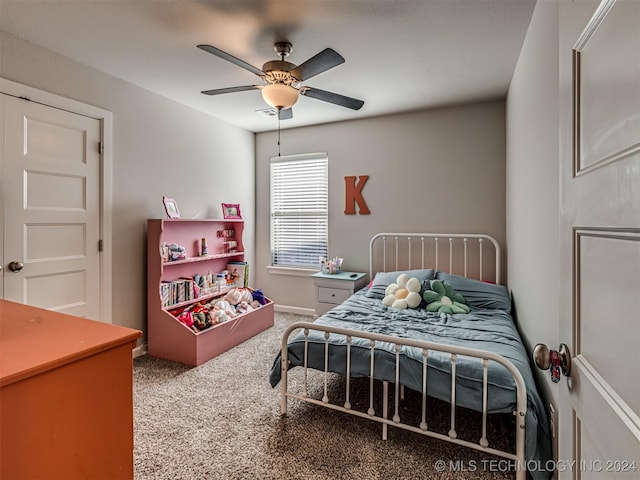 bedroom featuring ceiling fan and carpet floors