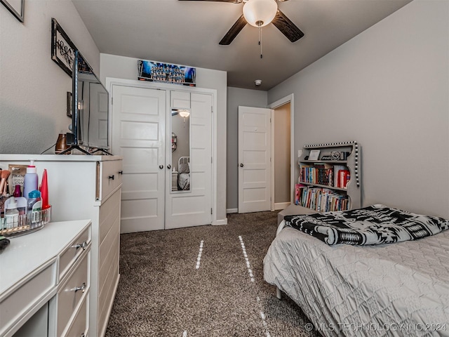 bedroom with ceiling fan, a closet, and dark carpet