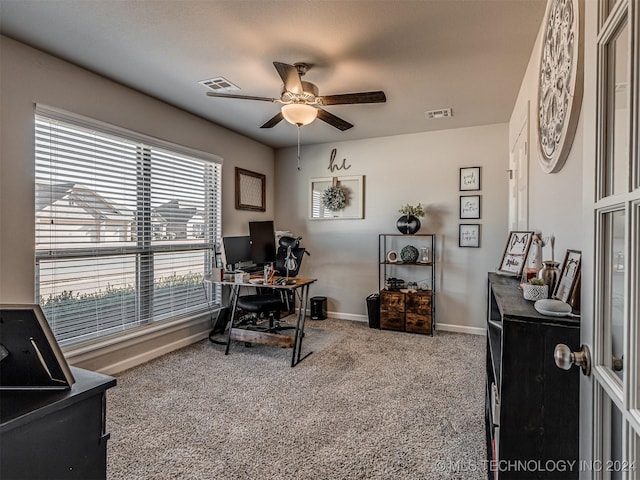 office space featuring carpet flooring and ceiling fan