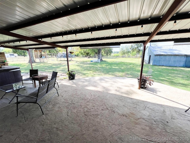 view of patio featuring a shed and a playground