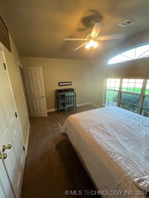 bedroom with ceiling fan and carpet