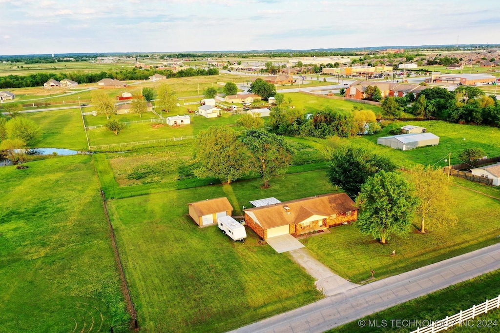 birds eye view of property featuring a rural view