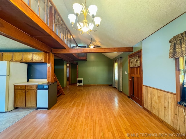 kitchen with white fridge, pendant lighting, a textured ceiling, ceiling fan with notable chandelier, and light wood-type flooring