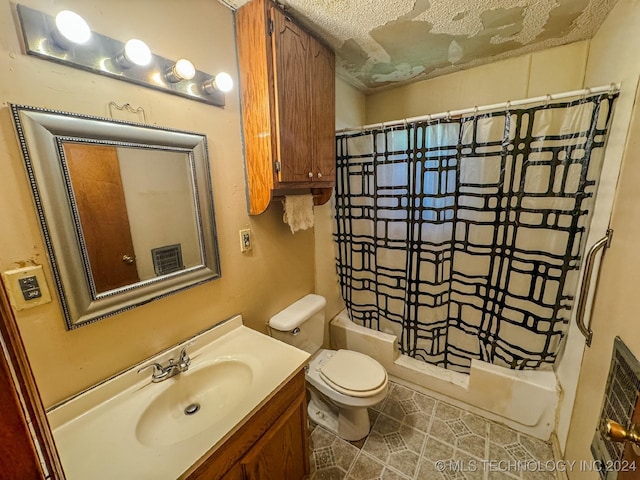 full bathroom featuring vanity, toilet, a textured ceiling, and shower / tub combo with curtain