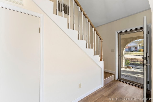 foyer entrance with light wood-type flooring