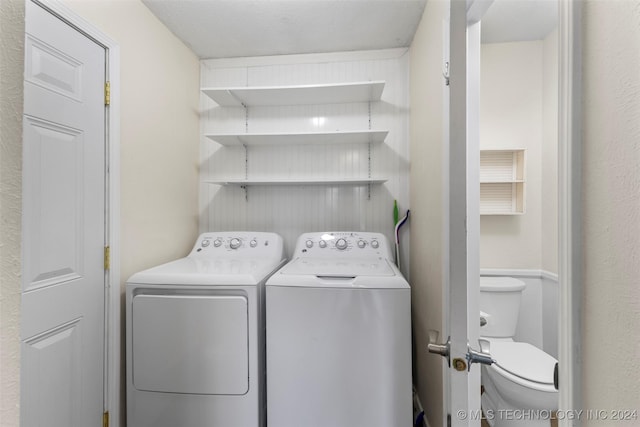 laundry area featuring separate washer and dryer