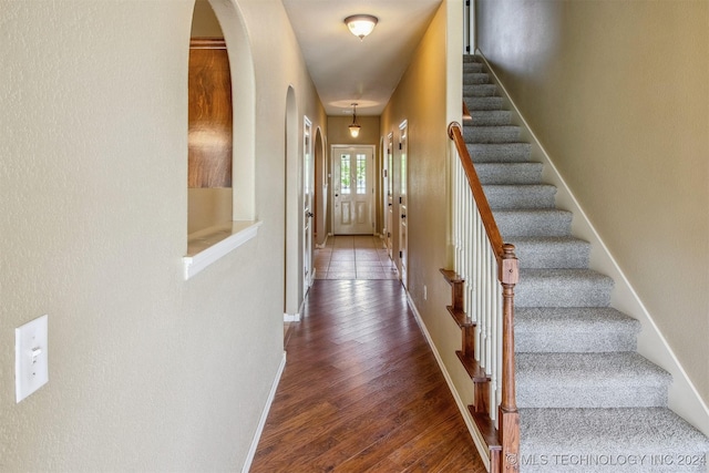 interior space with dark wood-type flooring