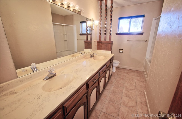 full bathroom featuring tile patterned flooring, vanity, toilet, and shower / washtub combination