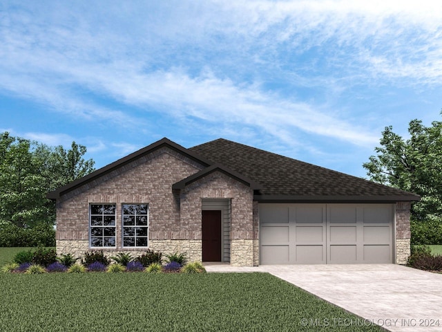 view of front of house with a front yard and a garage