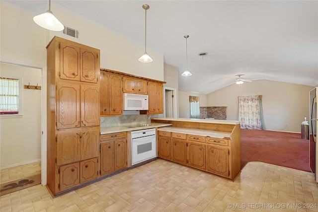 kitchen featuring ceiling fan, white appliances, hanging light fixtures, and vaulted ceiling