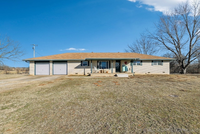 ranch-style home with a porch, a garage, and a front lawn