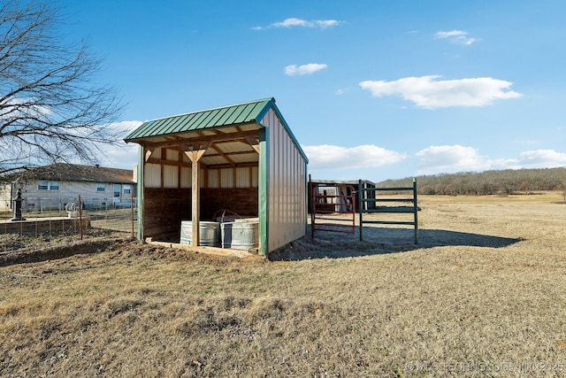 view of outbuilding with a yard