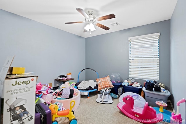 playroom with carpet flooring and ceiling fan