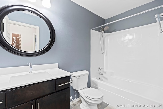 full bathroom with vanity, toilet, and washtub / shower combination