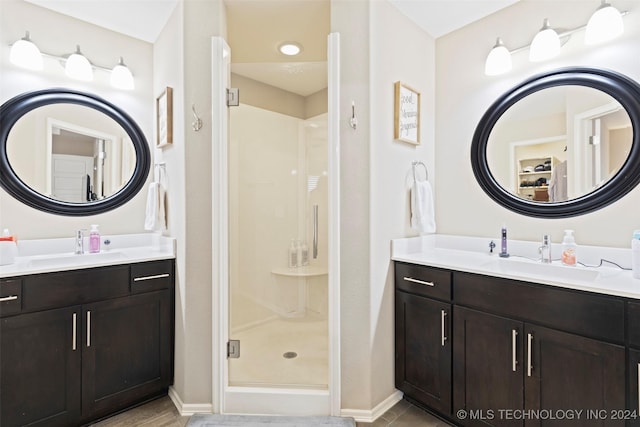 bathroom featuring vanity and walk in shower