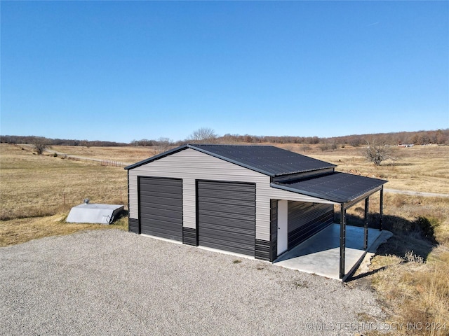 garage with a rural view