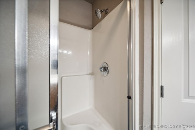 bathroom with walk in shower