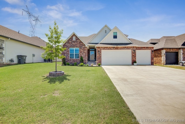 view of front facade featuring a garage and a front lawn