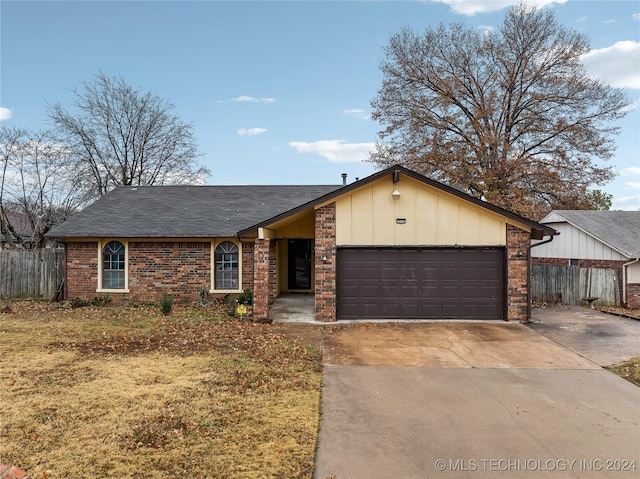 single story home with a garage