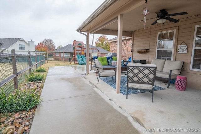 view of patio / terrace featuring a playground, an outdoor living space, and ceiling fan