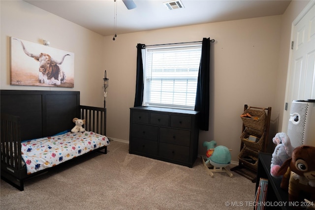 bedroom featuring carpet and ceiling fan