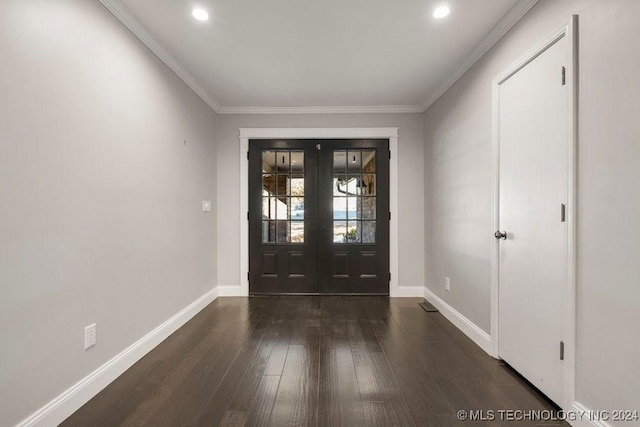 entrance foyer featuring french doors, dark hardwood / wood-style floors, and ornamental molding