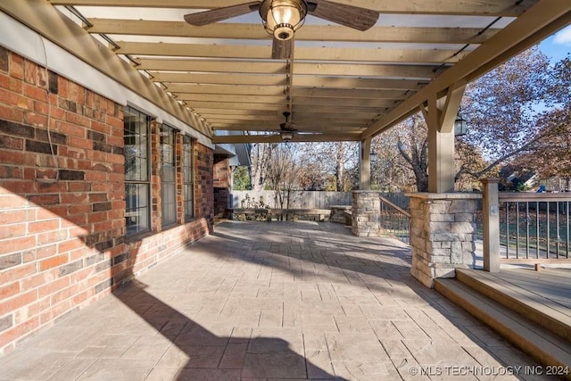 view of patio / terrace featuring ceiling fan