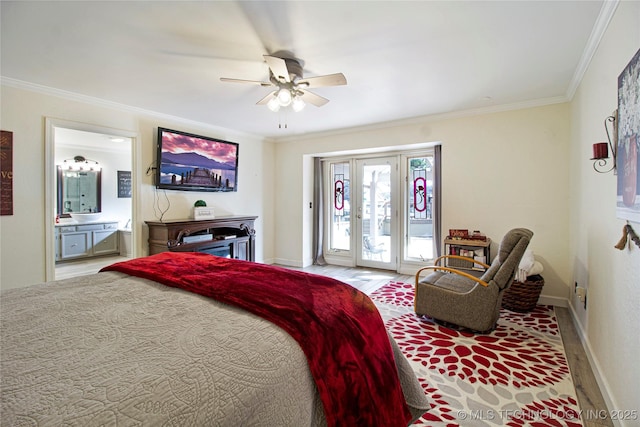 bedroom with access to exterior, light wood-style floors, ornamental molding, ensuite bath, and baseboards