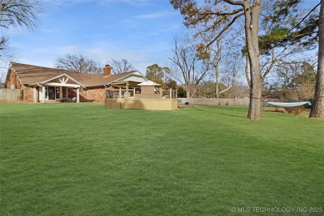 view of yard featuring fence