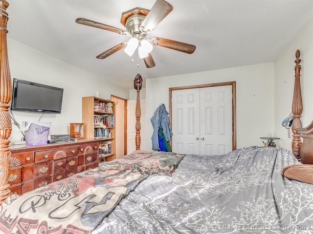 bedroom with ceiling fan and a closet