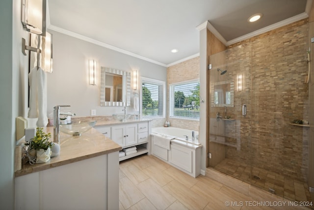 bathroom featuring crown molding, shower with separate bathtub, and vanity