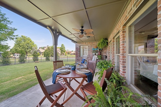 view of patio / terrace featuring ceiling fan