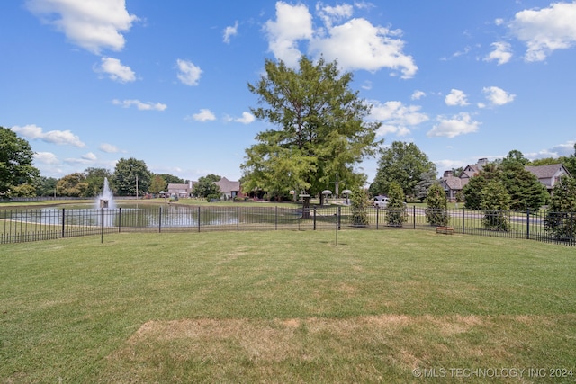 view of yard with a water view