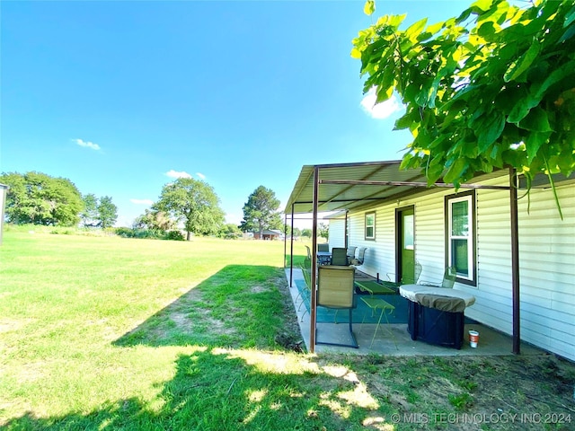 view of yard featuring a patio area