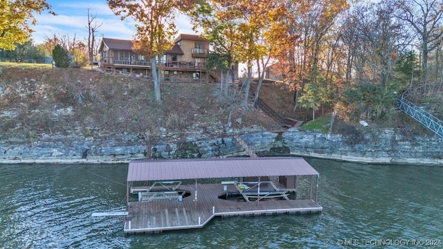 dock area featuring a water view